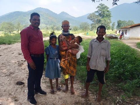 Visiting a Bondo family.